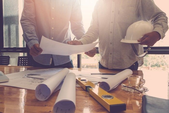 Two people Planning Local Development 