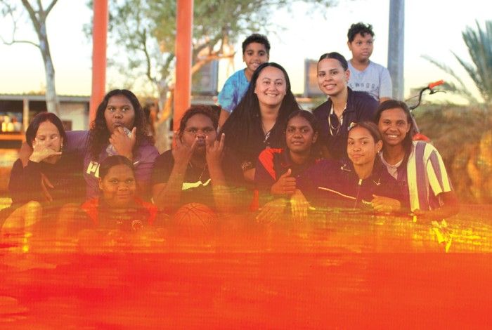 image of youth shed staff and youth smiling at the camera