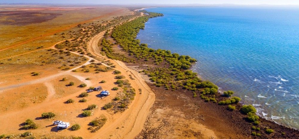 Drone shot of camp ground on coast